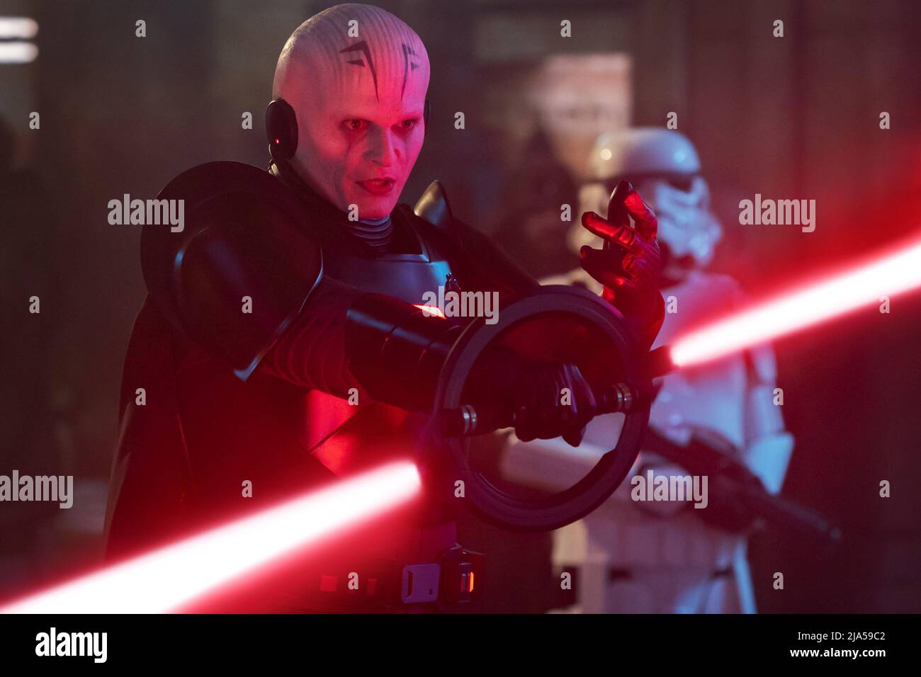(L-R): Grand Inquisitor (Rupert Friend) and a Stormtrooper in a scene from 'OBI-WAN KENOBI' Stock Photo