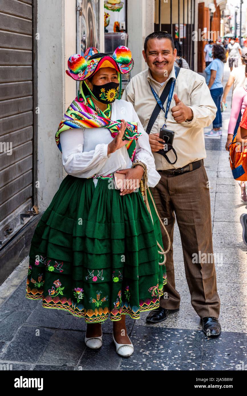 An Indigenous Woman In Traditional Costume In The Historical District Of Lima, Lima, Peru. Stock Photo