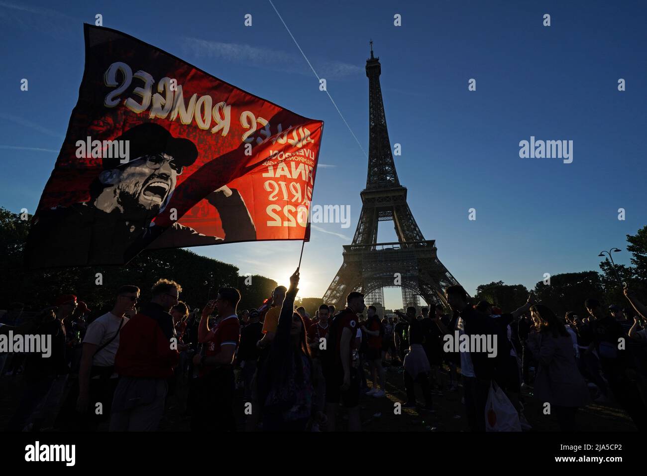 Football fans near the Eiffel Tower in Paris ahead of Saturday's UEFA Champions League Final between Liverpool FC and Real Madrid at the Stade de France, in Paris France. Picture date: Friday May 27, 2022. Stock Photo