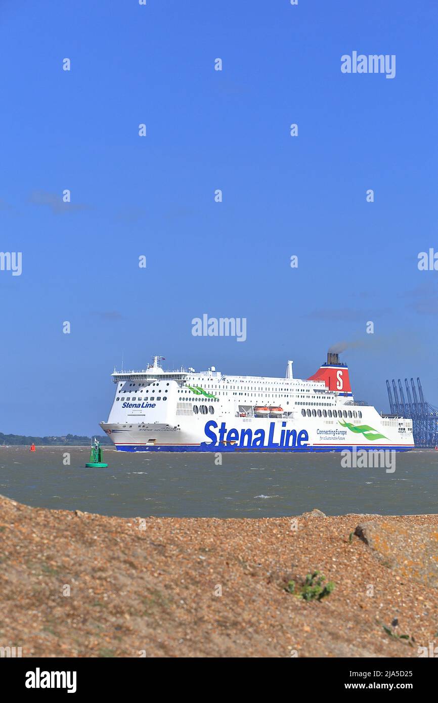 Stena Line ferry Stena Hollandica leaving Harwich Haven and passing Felixstowe Docks. Stock Photo