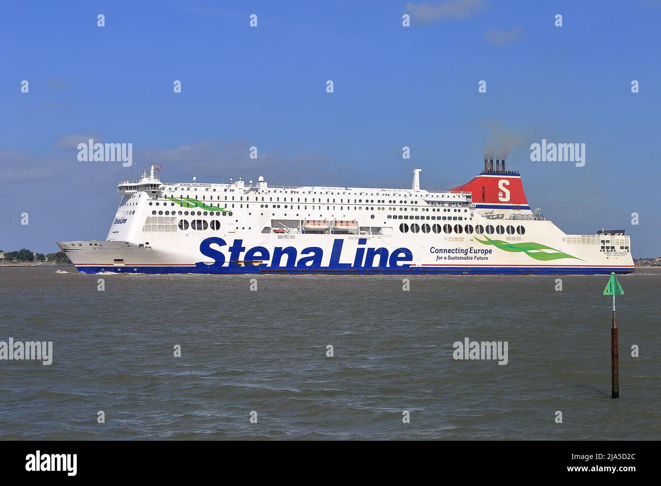 Stena Line ferry Stena Hollandica leaving Harwich Haven and passing Felixstowe Docks. Stock Photo