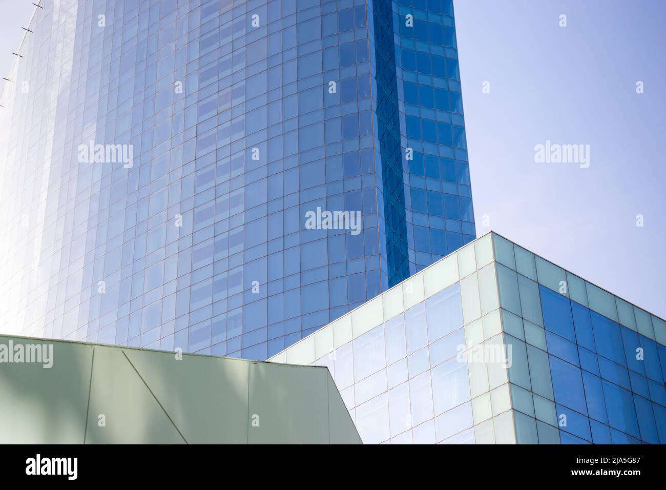 blue abstract architecural  view of glass skyscrapers with geometric pattern. Stock Photo