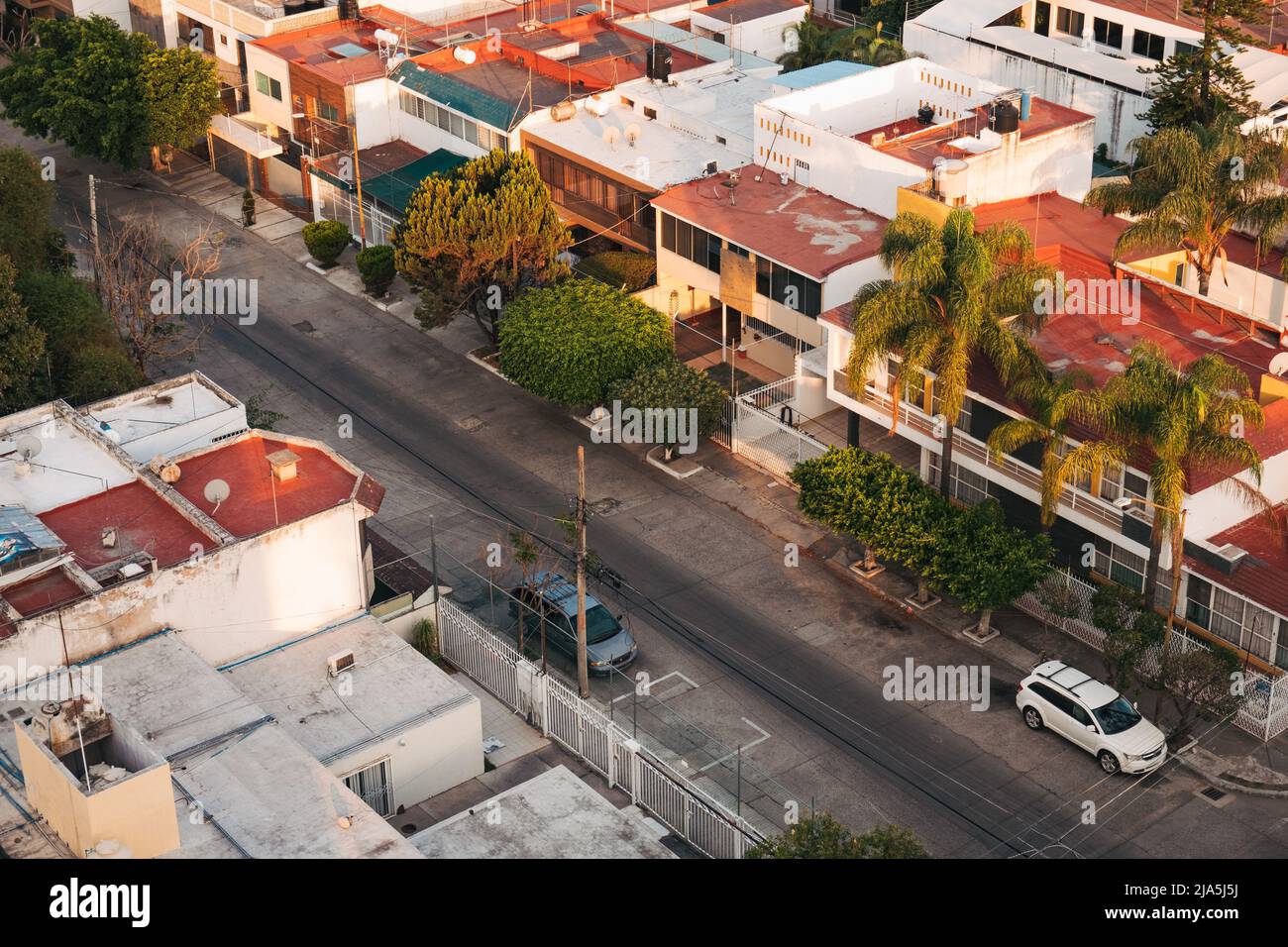 rectangular, concrete homes in the residential suburb of Jardines del