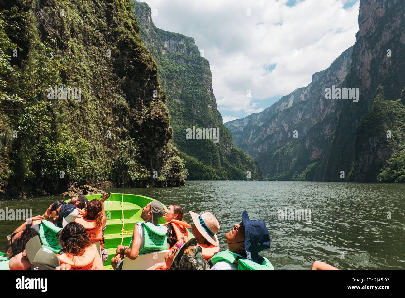 a boat of Mexican tourists in Sumidero Canyon, a deep natural canyon in