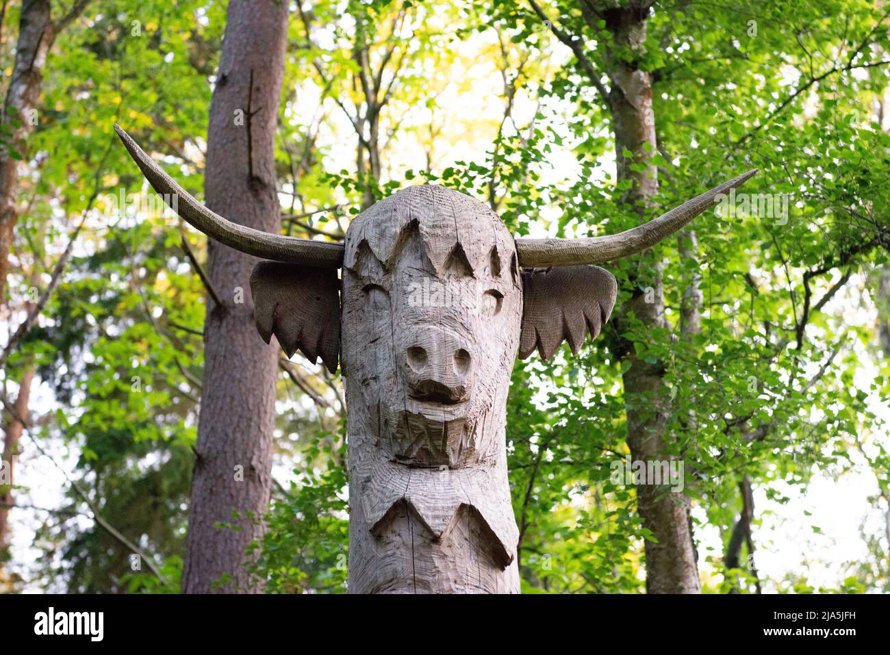 Carved Wooden totems on the Art Trail in West Blean Nature Reserve and Thornden Woods in Kent, England, UK Stock Photo