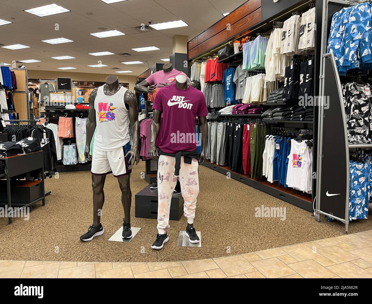 Springfield, IL USA - May 2, 2022: A display of Mens Nike Clothing for sale at the Scheels Sporting Goods store in Springfield, Illinois. Stock Photo