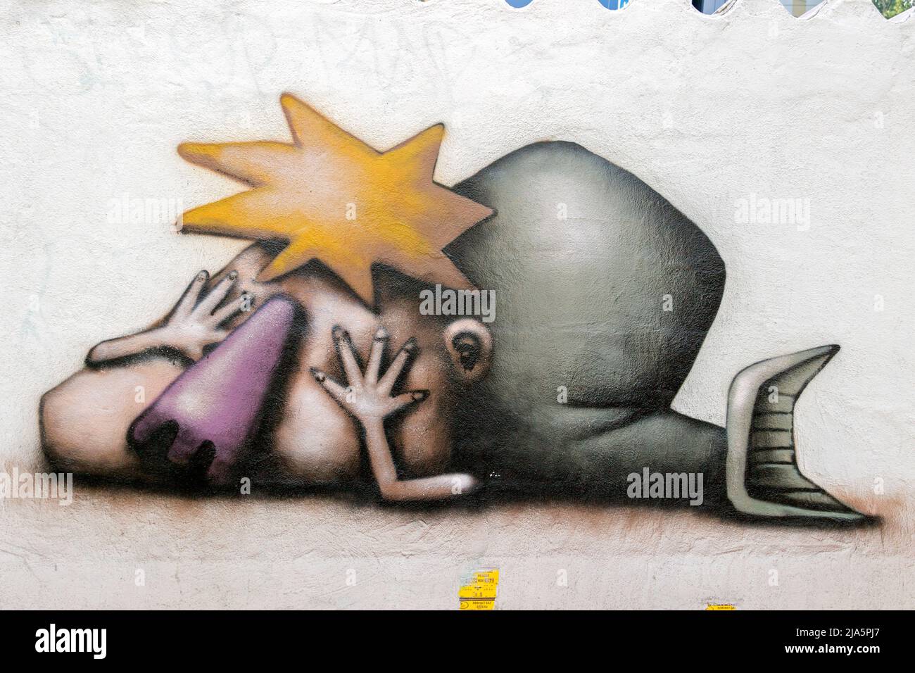 Graffiti by L empreinte jo v on a wall in support of Ukraine being invaded by the Russian army in Montpellier. Occitanie, France Stock Photo