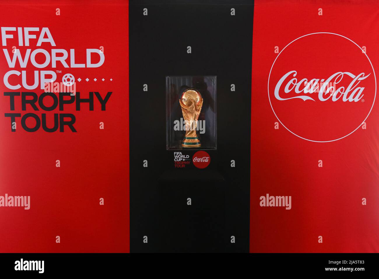 The FIFA World Cup trophy (C) seen on display at the Kenyatta International Convention Centre during the public viewing event. The Worldwide tour of the FIFA world cup trophy will cover at least 22 countries, including Kenya. Stock Photo