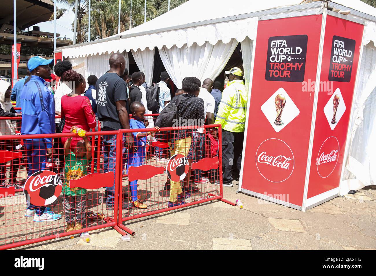Kenyan soccer fans queue to view the trophy during the FIFA World Cup