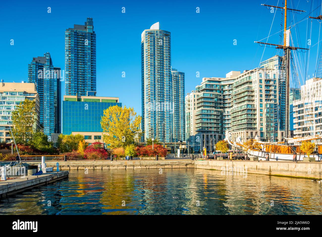 Condo towers and a schooner at the downtown waterfront in Toronto