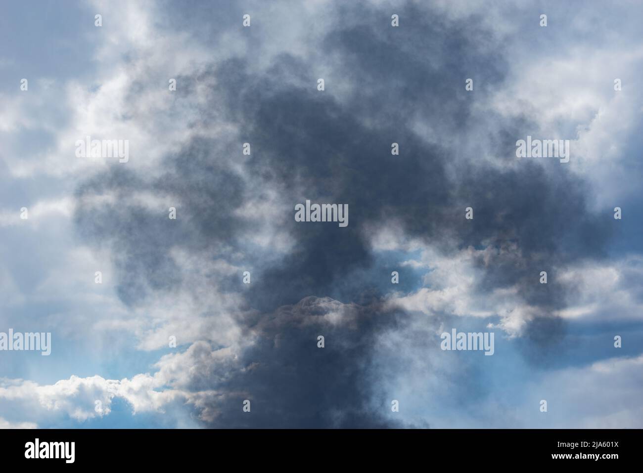Smoke on the sky background at day time Stock Photo - Alamy