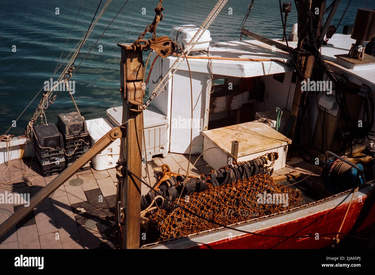 The Donna Jean fishing boat rests at the docks in Plymouth harbor. Plymouth Massachusetts. The image was captured on analog color film. Stock Photo