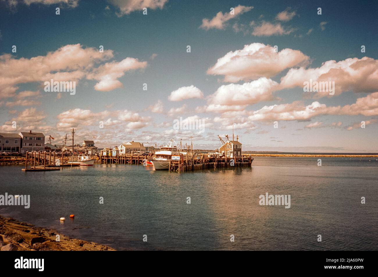 Capt John harbor cruse ship tied to the dock in Plymouth Harbor. Plymouth Massachusetts. The image was captured on analog color film.g Stock Photo