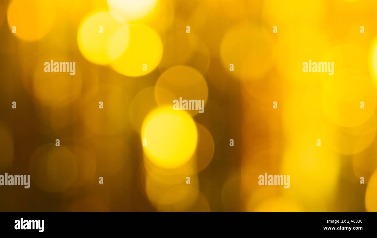 Abstract bokeh background. Abstract background of bright yellow and blue lights in soft focus