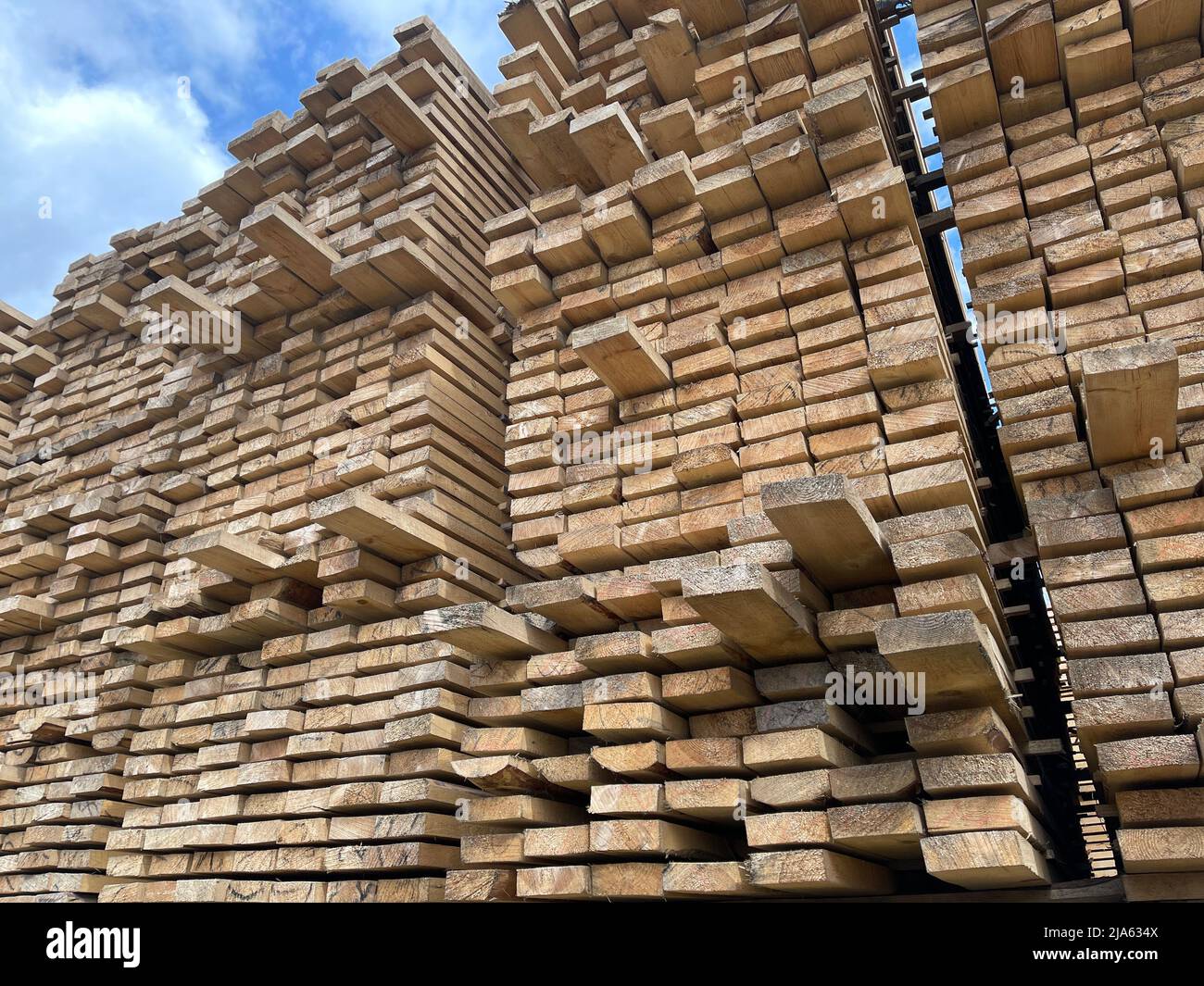 Wooden boards, lumber, industrial wood, timber. Pine wood timber stack