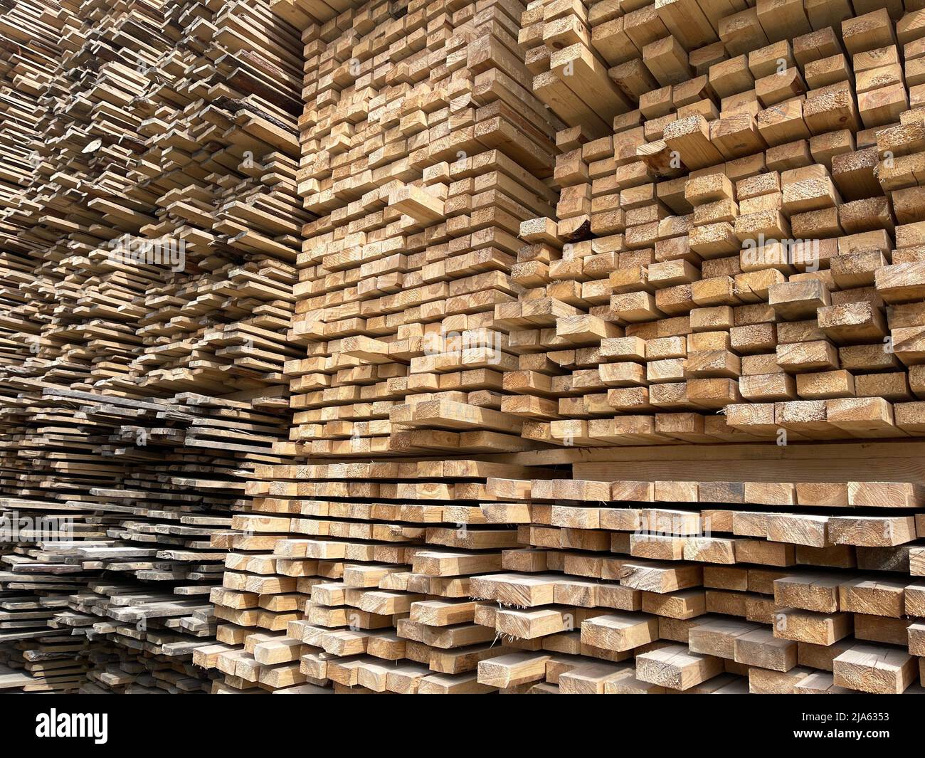 Wooden boards, lumber, industrial wood, timber. Pine wood timber stack