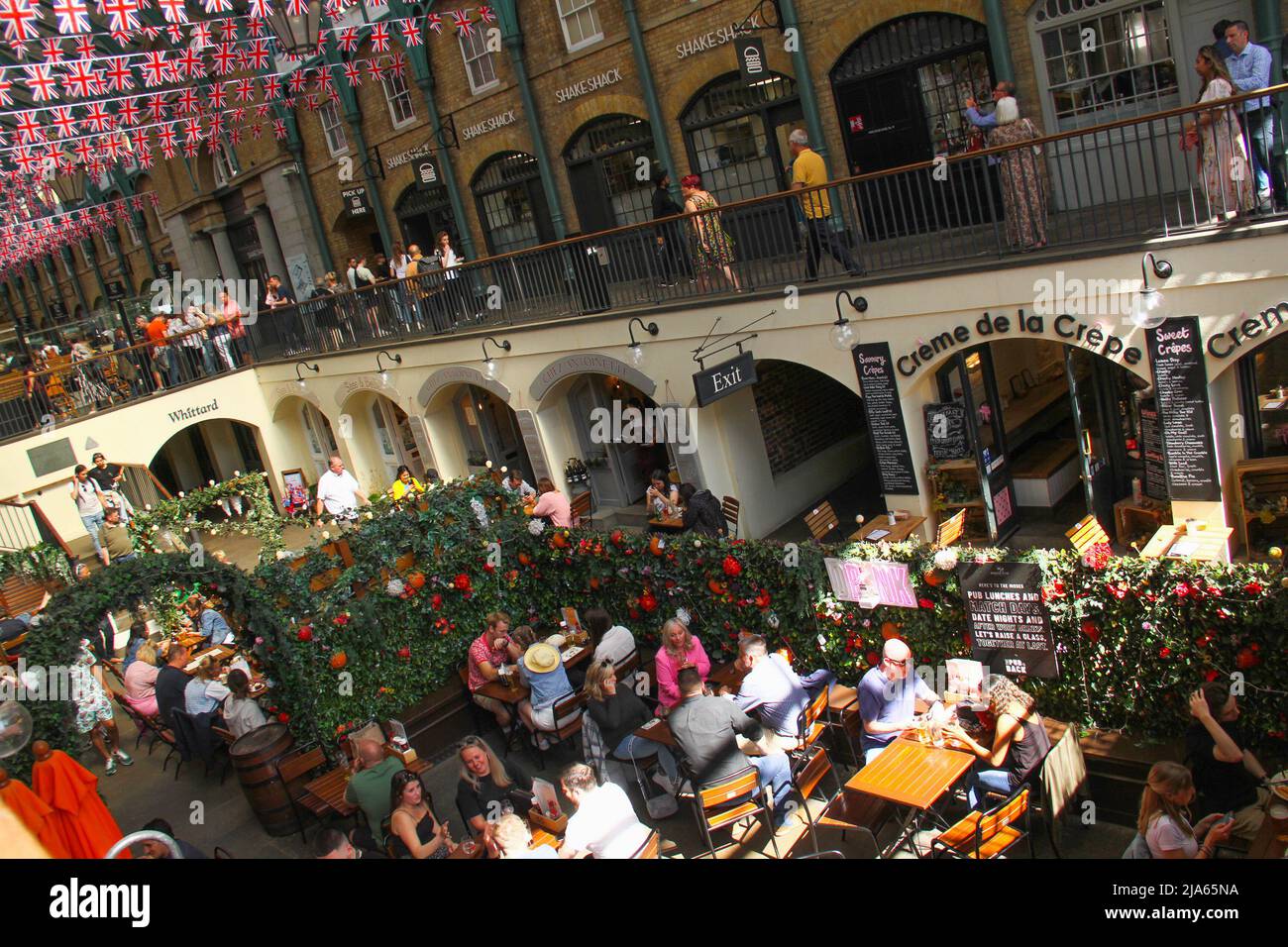Christmas Pageants 2022 Near Me London, Uk. 27Th May, 2022. People Enjoy Meals At The Covent Garden Market  With A Backdrop Of Banting Made Up Of Union Jack Flags Adorned At The  Covent Garden Market Ahead Of