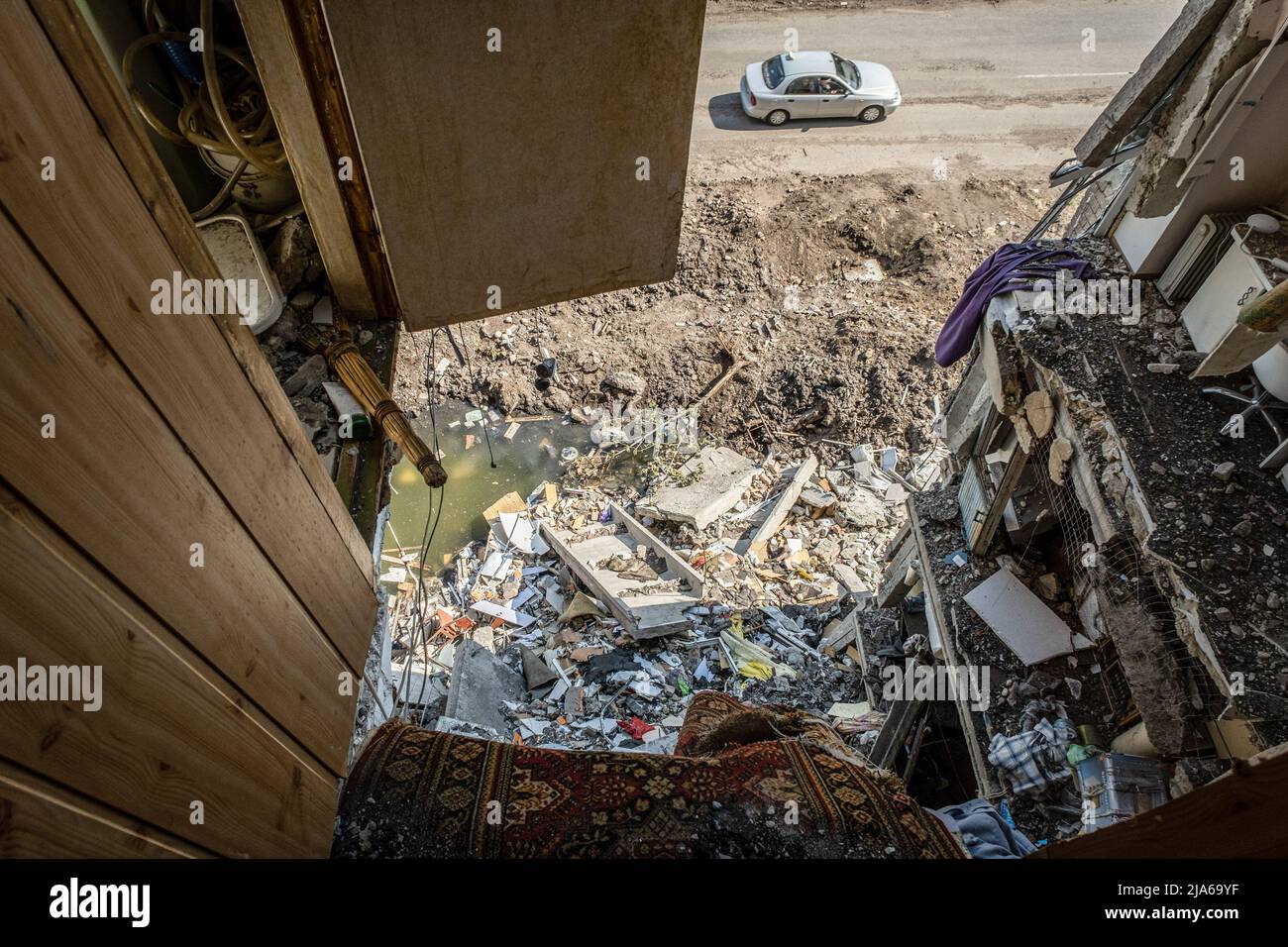 Bakhmut, Ukraine. 24th May, 2022. A view from the top floor of the residential building destroyed by Russian artillery strikes in Bakhmut, Donbas. As Bakhmut stands as a key city to Ukrainian forces in defending Donetsk(Donbas) region, the city is under attack by the Russian troops. The Russian invasion of Ukraine started on February 24, the war that has killed numerous civilians and soldiers. Credit: SOPA Images Limited/Alamy Live News Stock Photo