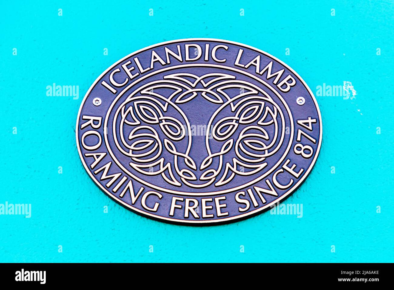 Wall plaque with the inscription: Icelandic Lamb - Roaming free since 874 (Reykjavik, Iceland) Stock Photo