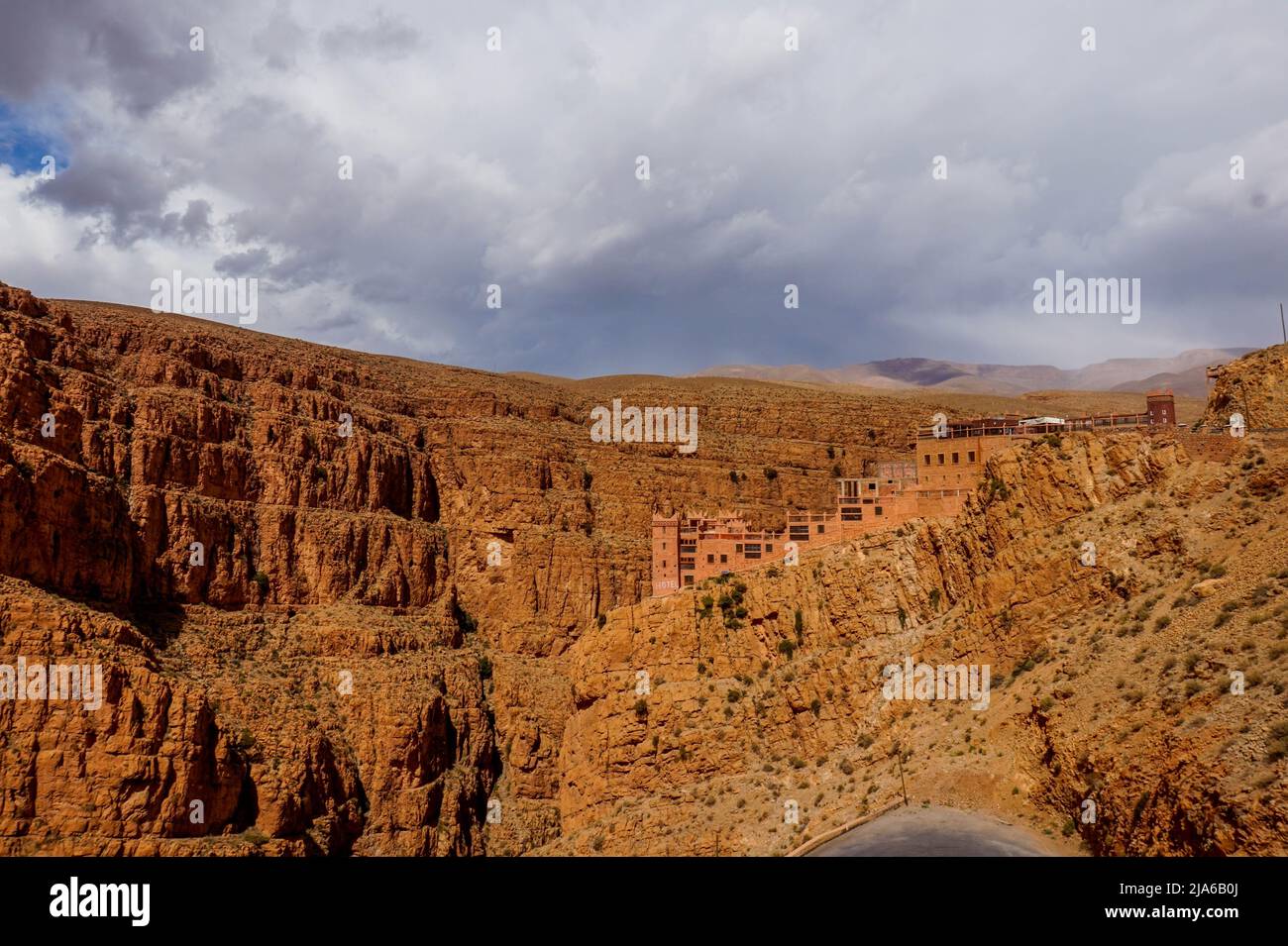A Top Of The Canyon in Moroccan desert with sand houses on the ridge