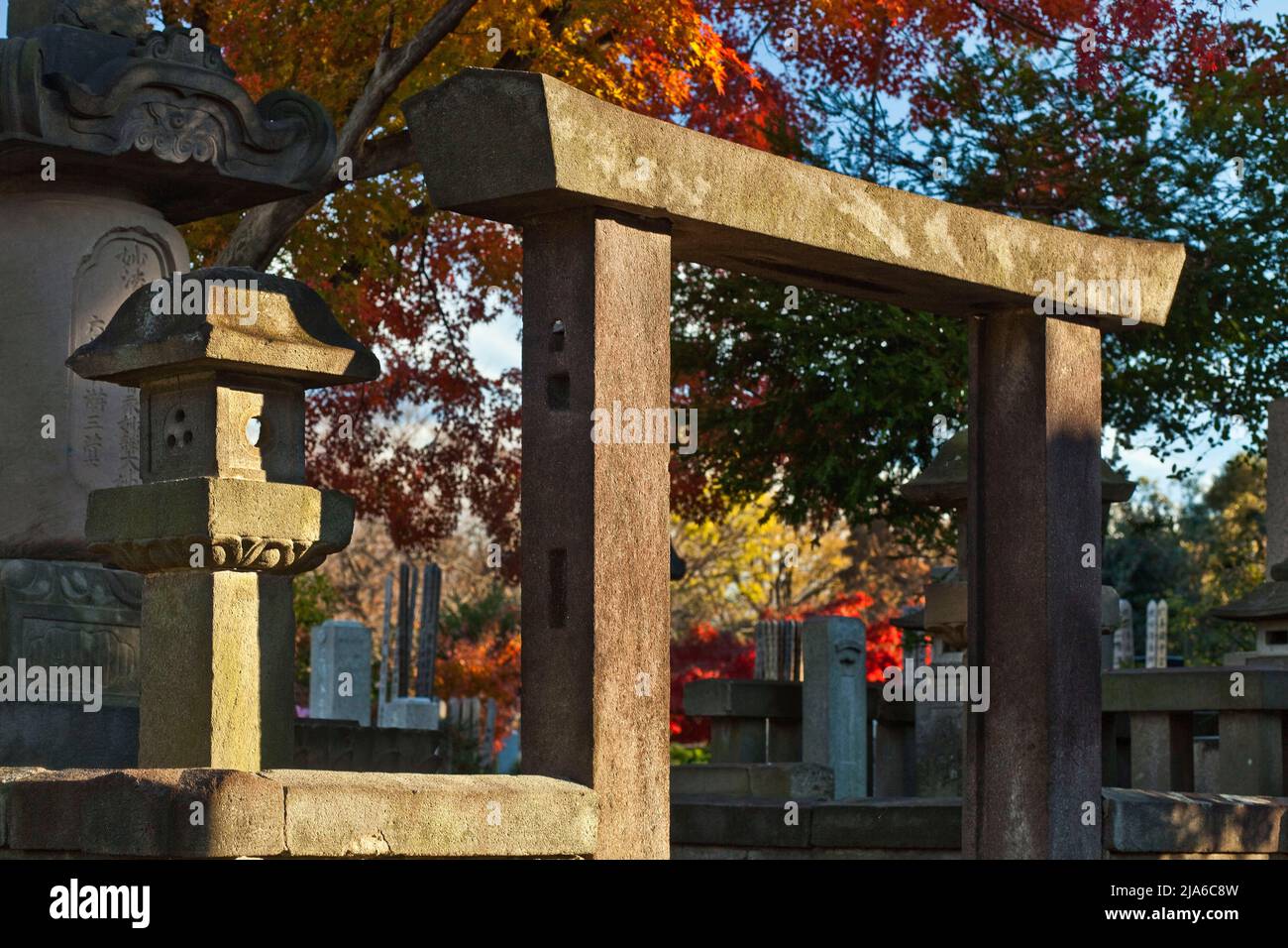 Cemetery markers and gate Ikegami Honmonji Temple autumn Tokyo Japan Stock Photo