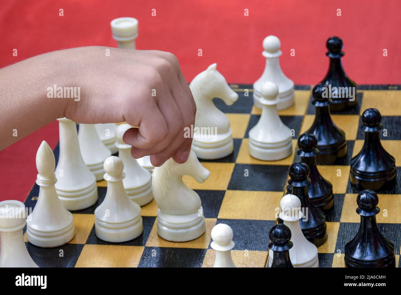 Human hand move chess figure hi-res stock photography and images - Alamy