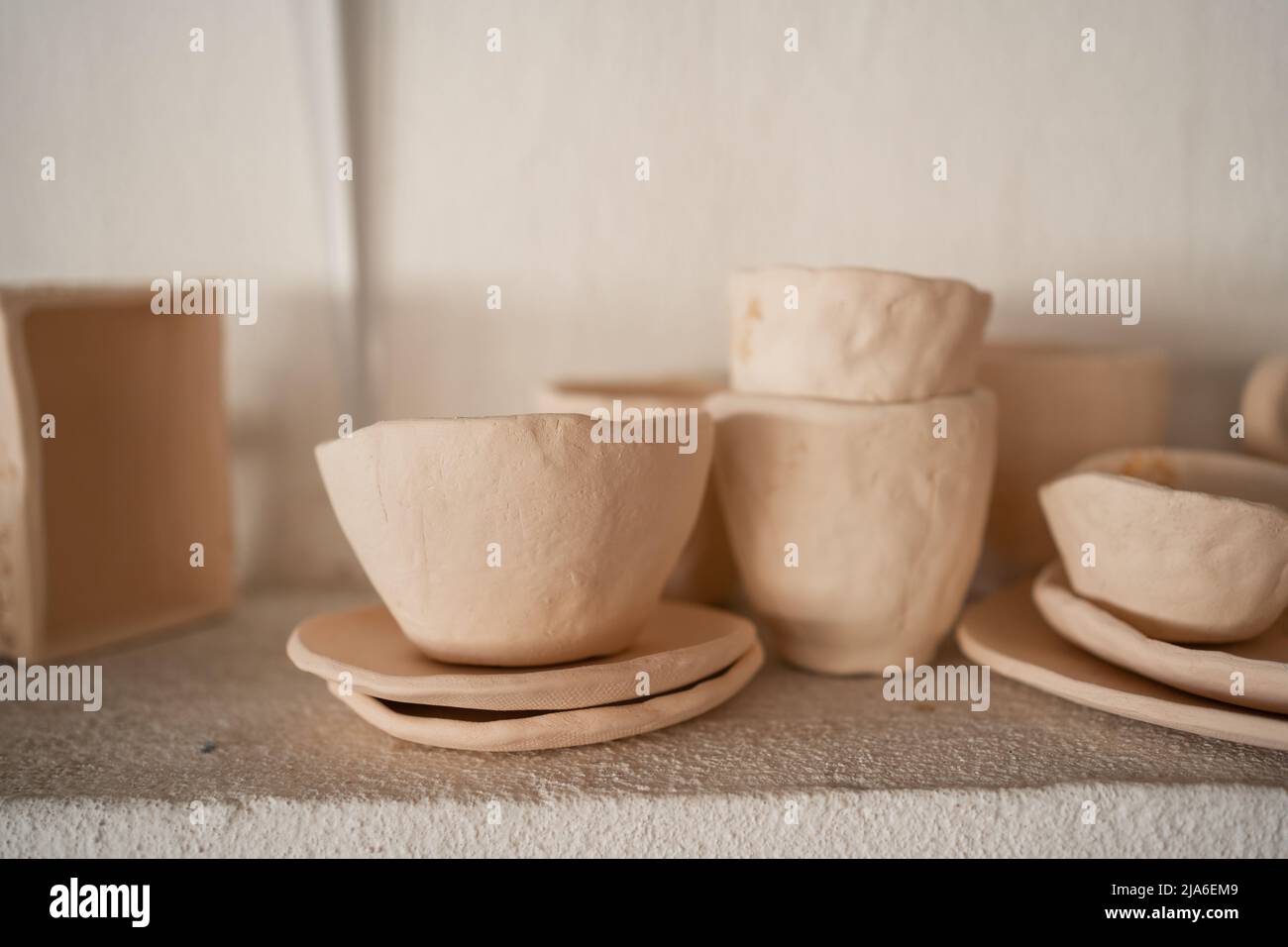 Ready-made ceramic dishes bowls and handmade dishes. Stock Photo