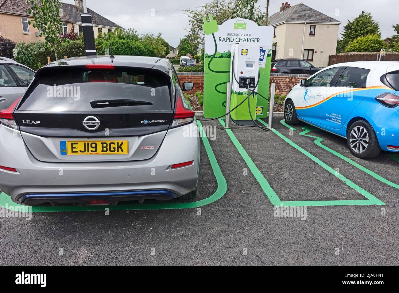 Nissan Leaf and Renault Zoe charging at fast EV charger in Lidl car