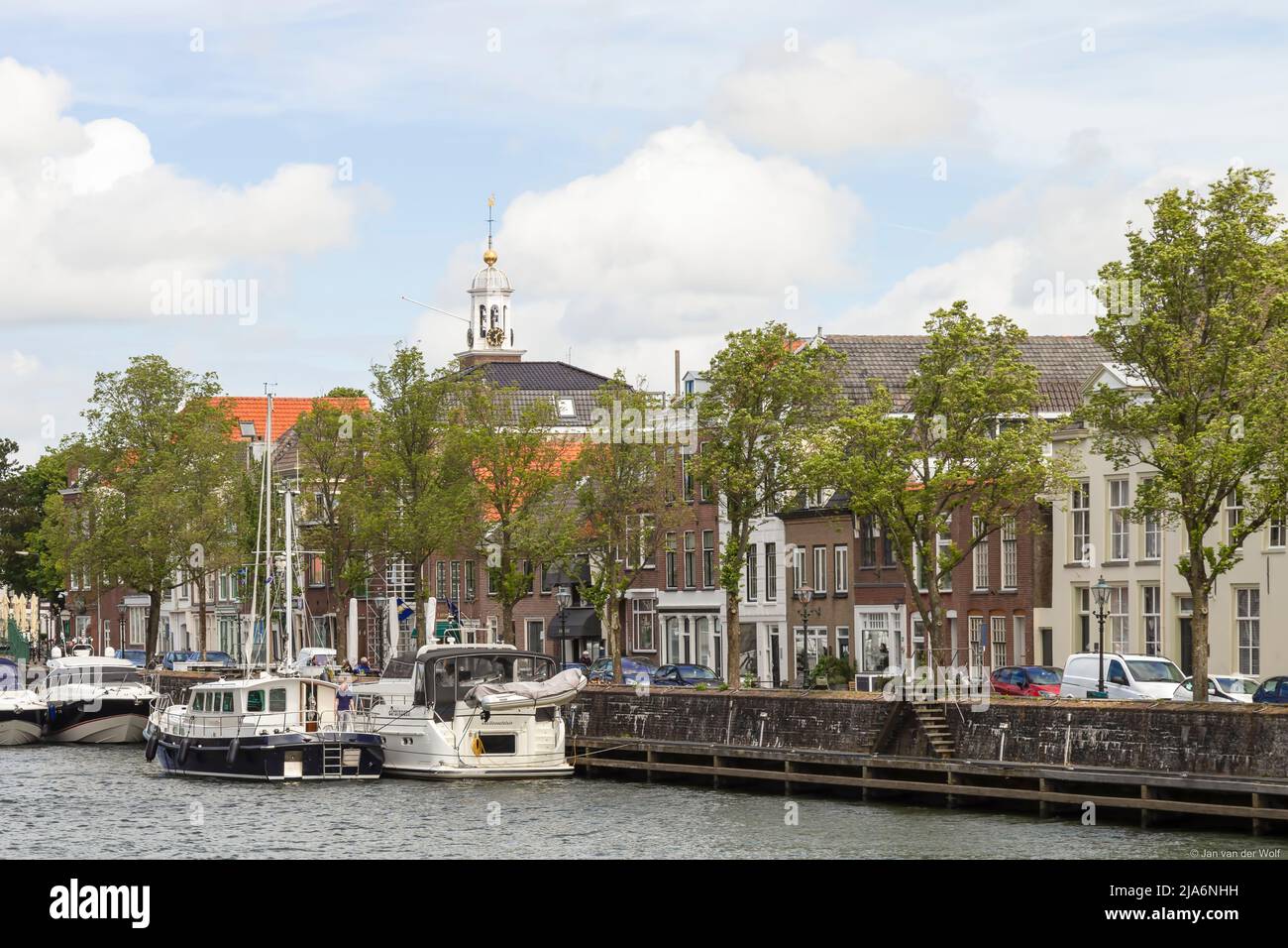 Quayside with historic canal houses and yachts in the center of the