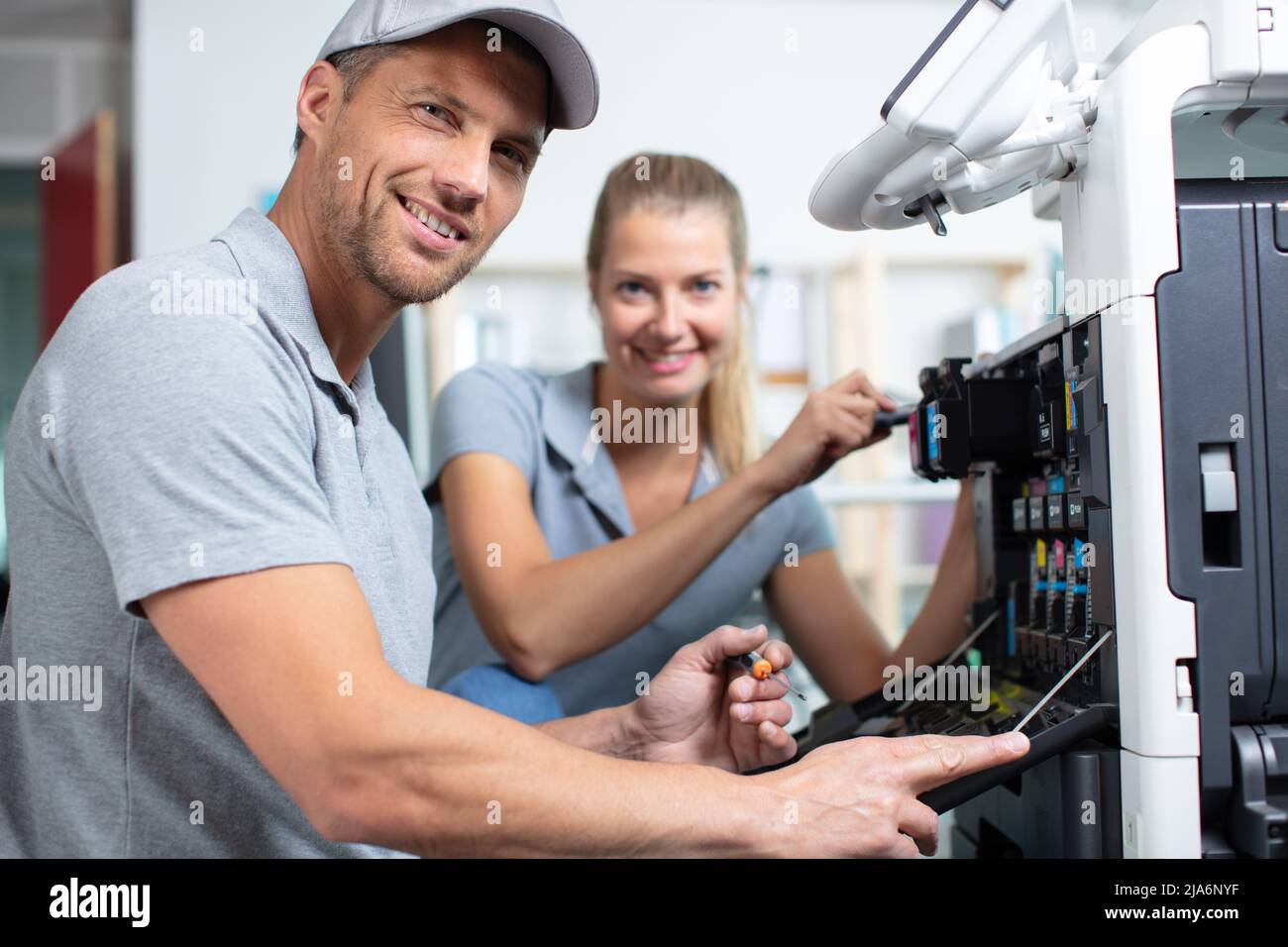 Man woman photocopier office hi-res stock photography and images - Alamy