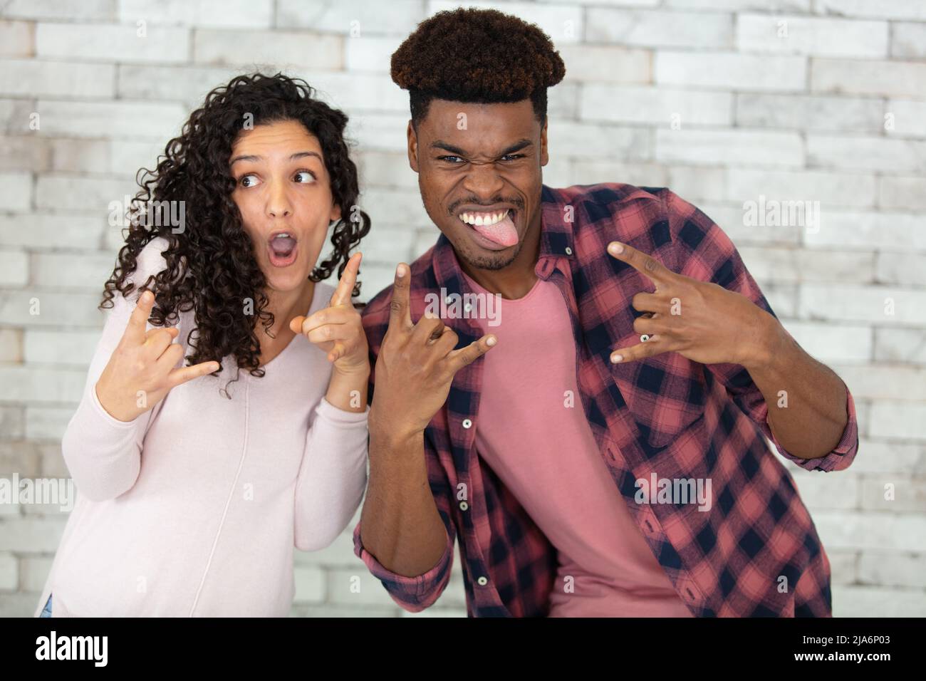 overjoyed excited couple celebrates win enjoy victory rejoice success Stock Photo