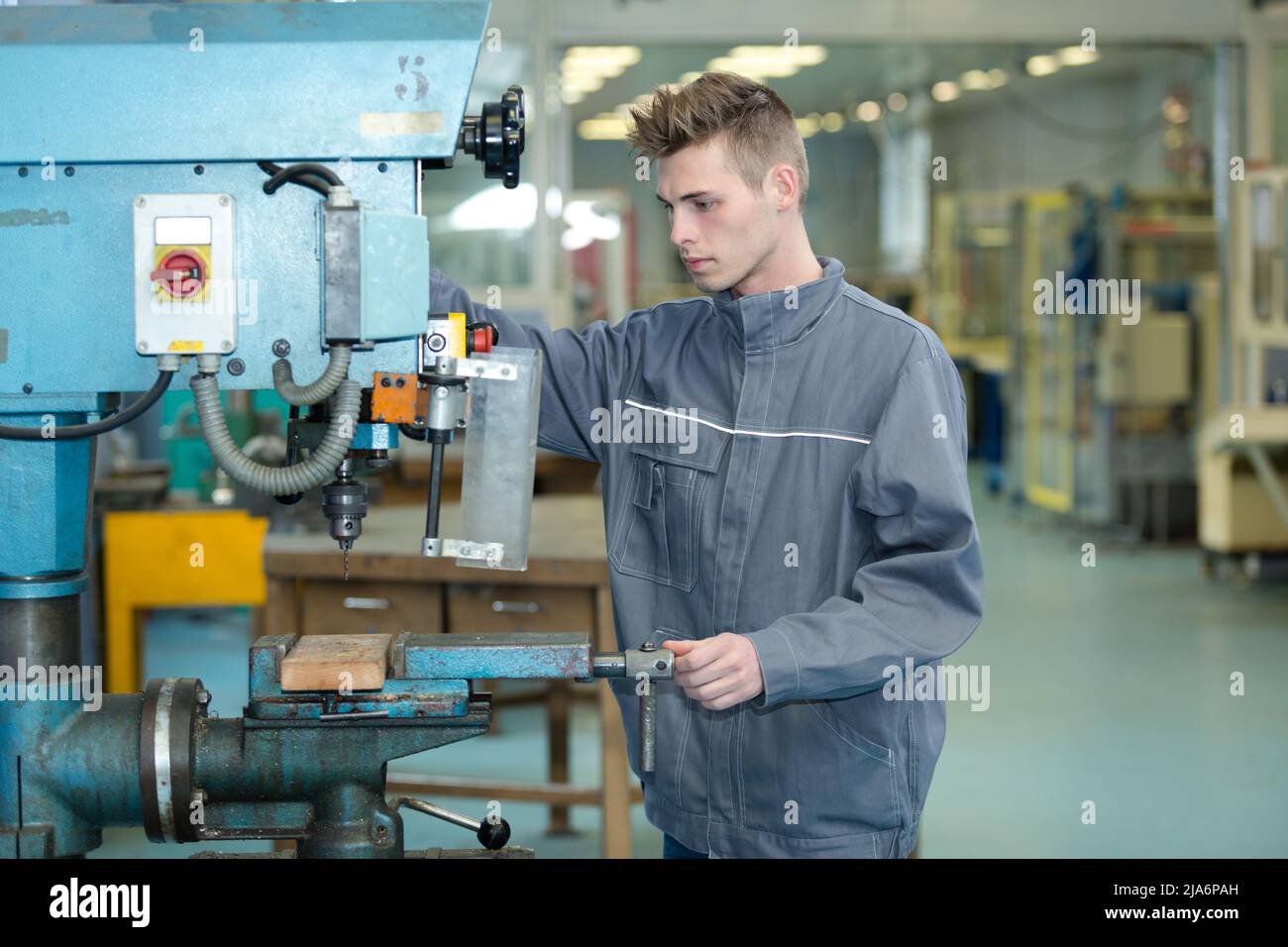 Engineering Working Machine Engineer apprentice using machinery hi-res stock photography and images ...