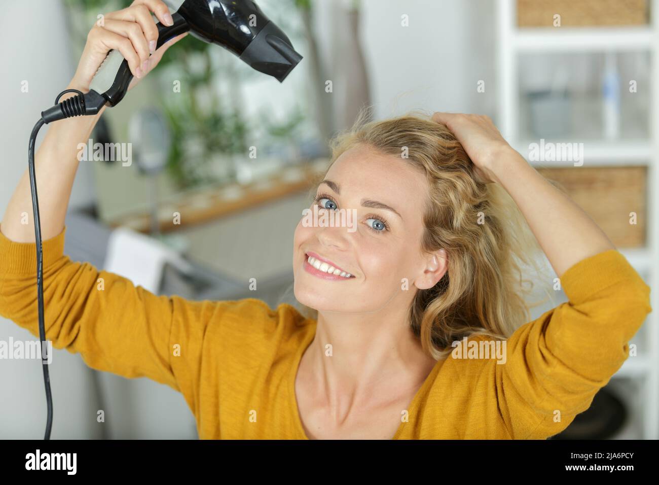 Pretty woman drying long hi-res stock photography and images - Alamy