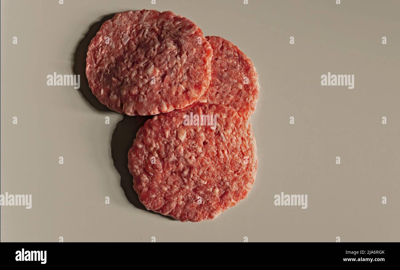 Ultraprocessed food, three very fatty meat burgers of poor quality