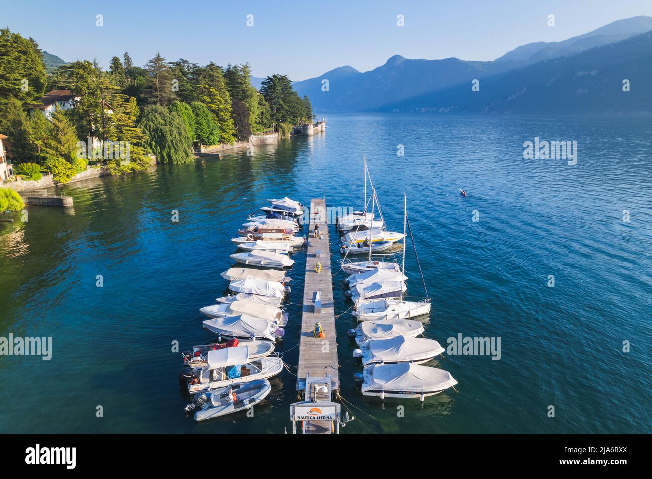 Aerial view of pier speedboat. This is usually the most popular tourist attractions on the como lake. Stock Photo