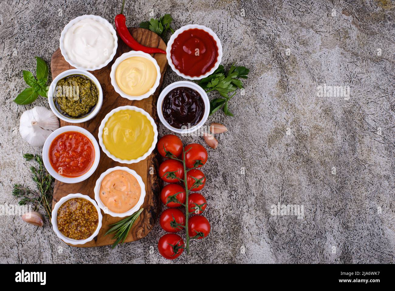 Set of different sauces. Ketchup, mustard and mayonnaise Stock Photo