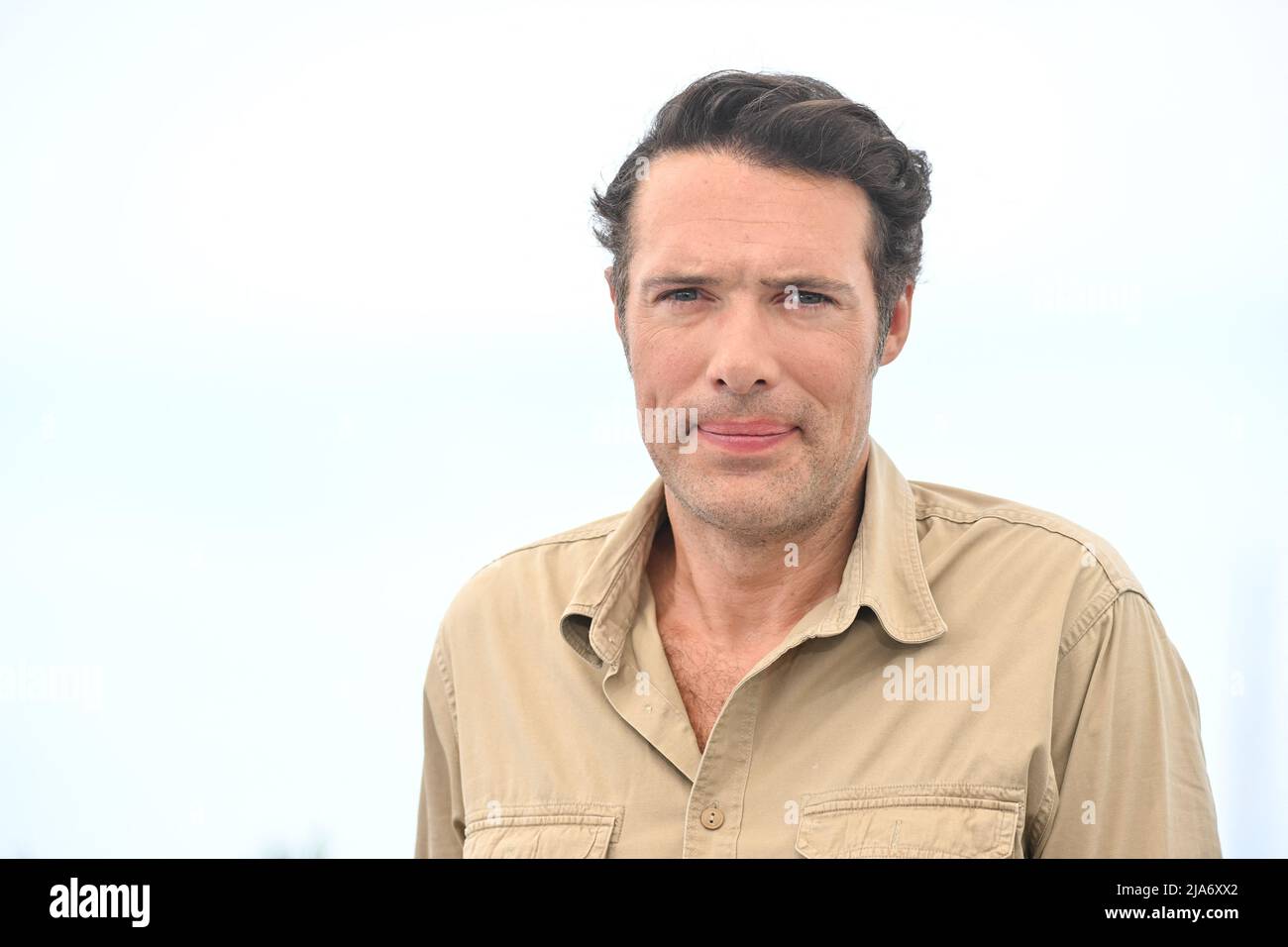 Nicolas Bedos attending the photocall of the movie Mascarade during the  75th Cannes Film Festival in Cannes, France on May 28, 2022. Photo by  Julien Reynaud/APS-Medias/ABACAPRESSS.COM Stock Photo - Alamy