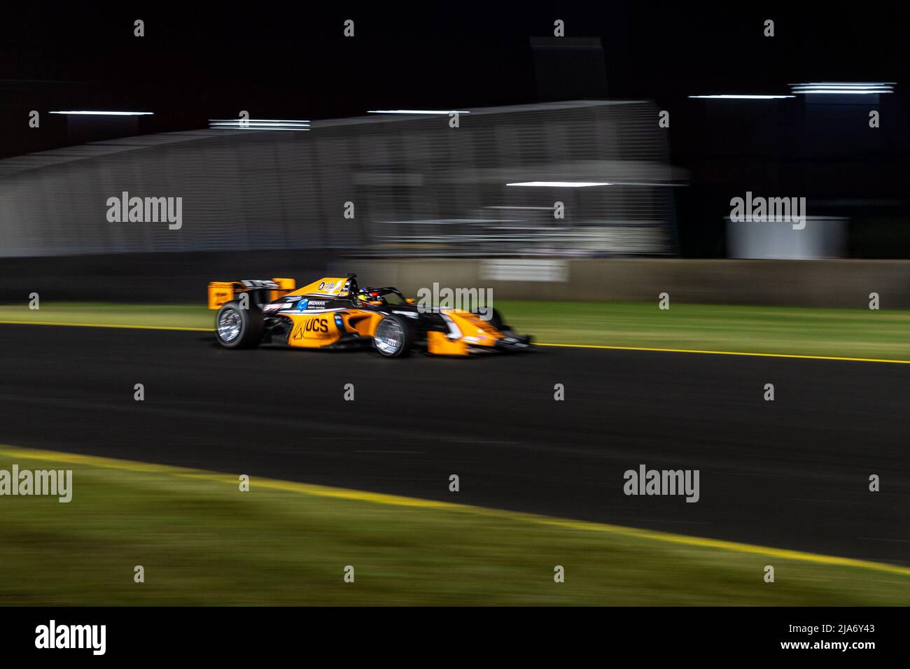 Sydney, Australia. 28 May, 2022. Tim Macrow (#23) piloting his UCS Group Racing S5000 over the bridge at Sydney Motorsport Park during Race 1 of the S5000 Australian Driver's Championship. Credit: James Forrester / Alamy Live News. Stock Photo