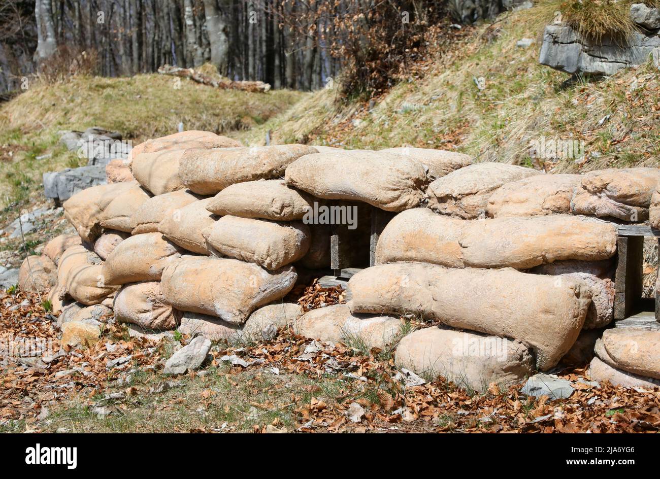Sandbags for the protection of the war trenches dug into the mountain by the soldiers army Stock Photo