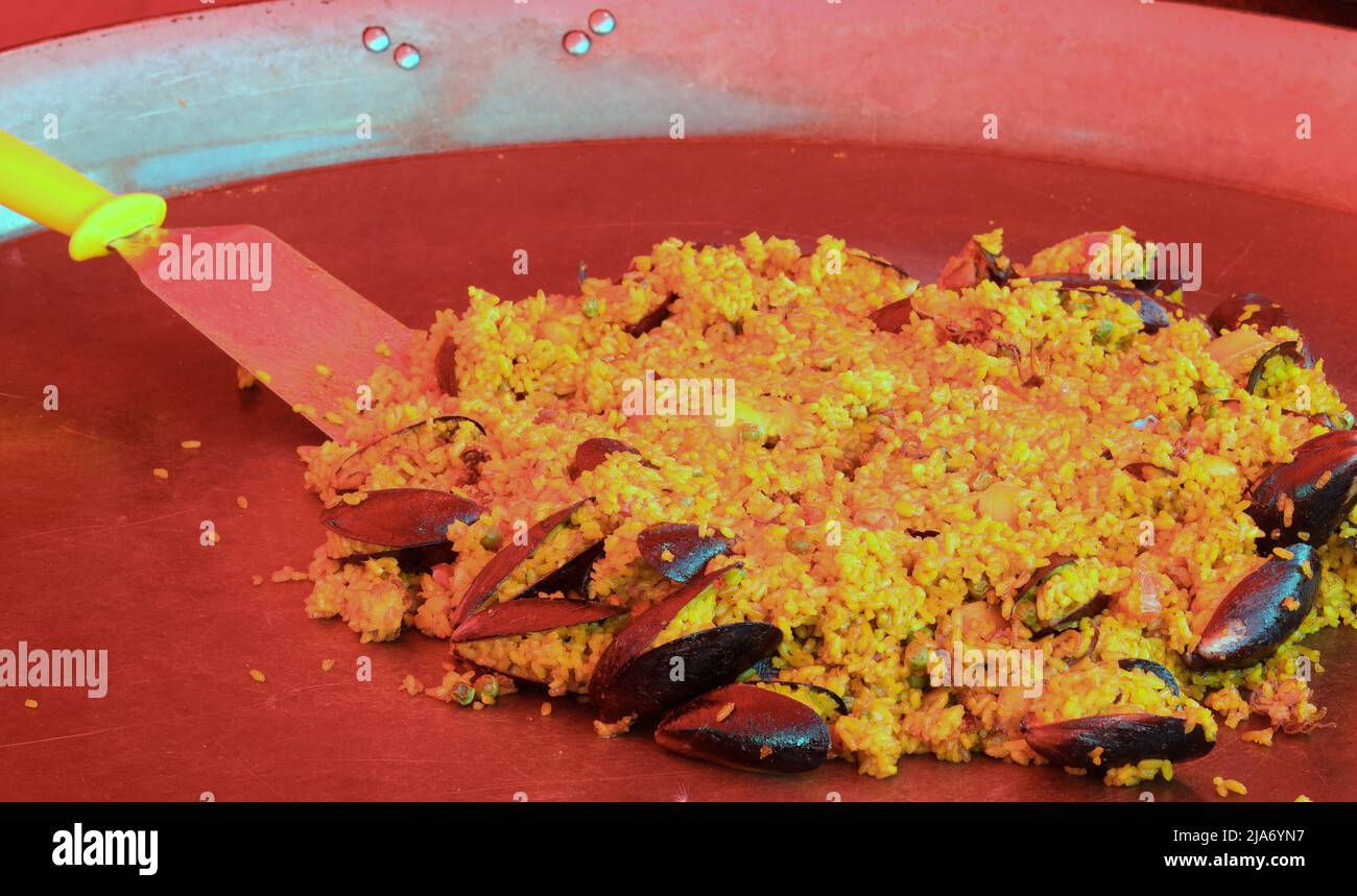 typical-spanish-dish-called-paella-with-rice-cooked-with-seafood-and