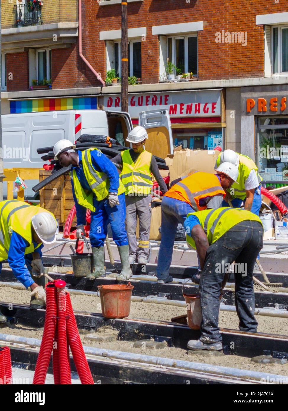 Paris, France, Construction Workers on Street, Tram Rails installations