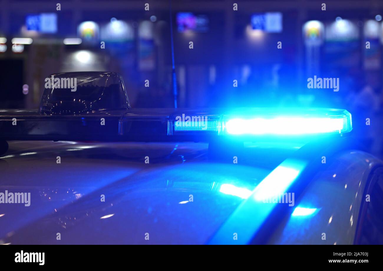 Police car siren flashing blue in the night during law enforcement checkpoint Stock Photo Alamy