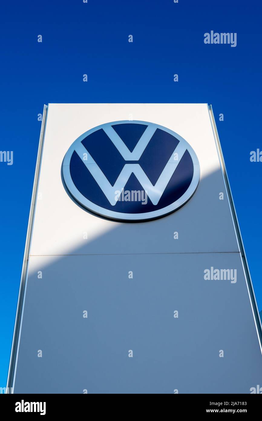 Exterior commercial sign with the brand logo of the German car manufacturer Volkswagen Stock Photo