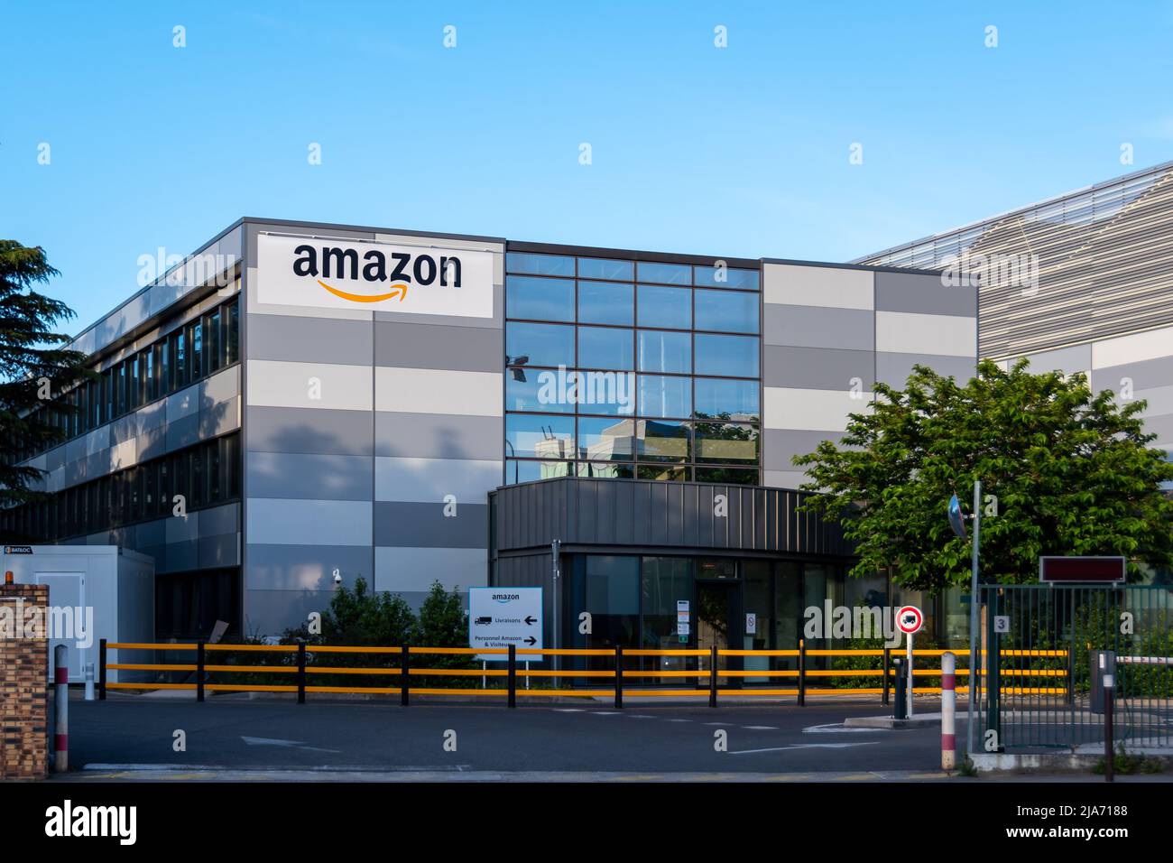 Exterior view of the Amazon Logistics delivery agency in Velizy-Villacoublay, France, serving the south of the Paris region Stock Photo