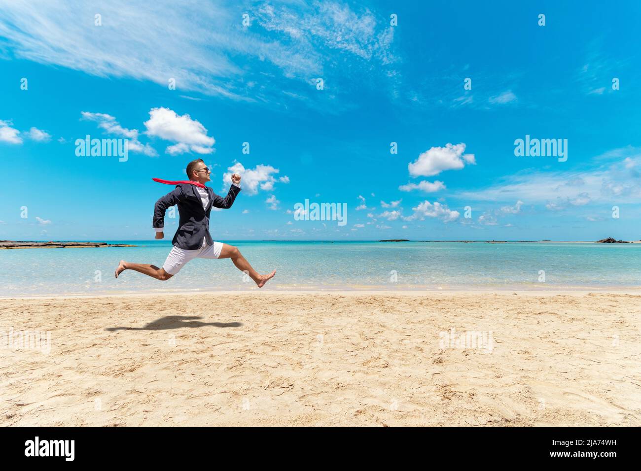 Funny businessman runs from office work on the beach. Summer holiday concept Stock Photo - Alamy Funny businessman runs from office work on the beach. Summer holiday concept Stock Photo - Alamy