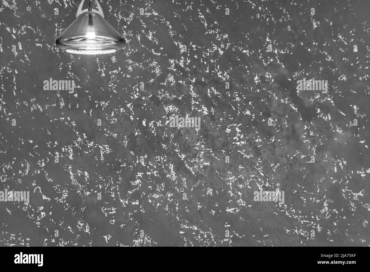 Pendant lamp in glass frame light on the ceiling in modern interior