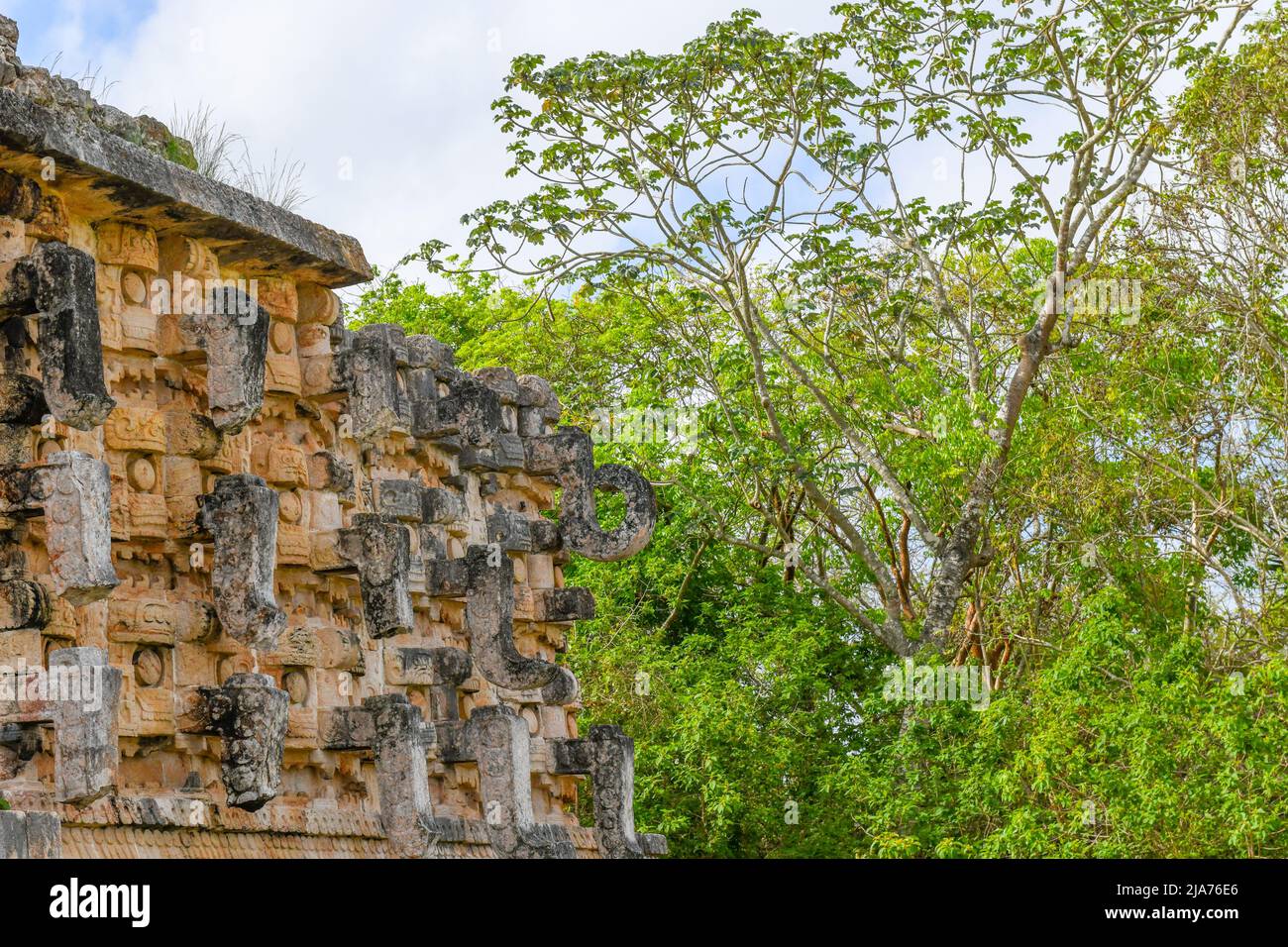 The Mayan ruins of Kabah surrounded by the jungle, Yucatan Mexico Stock Photo