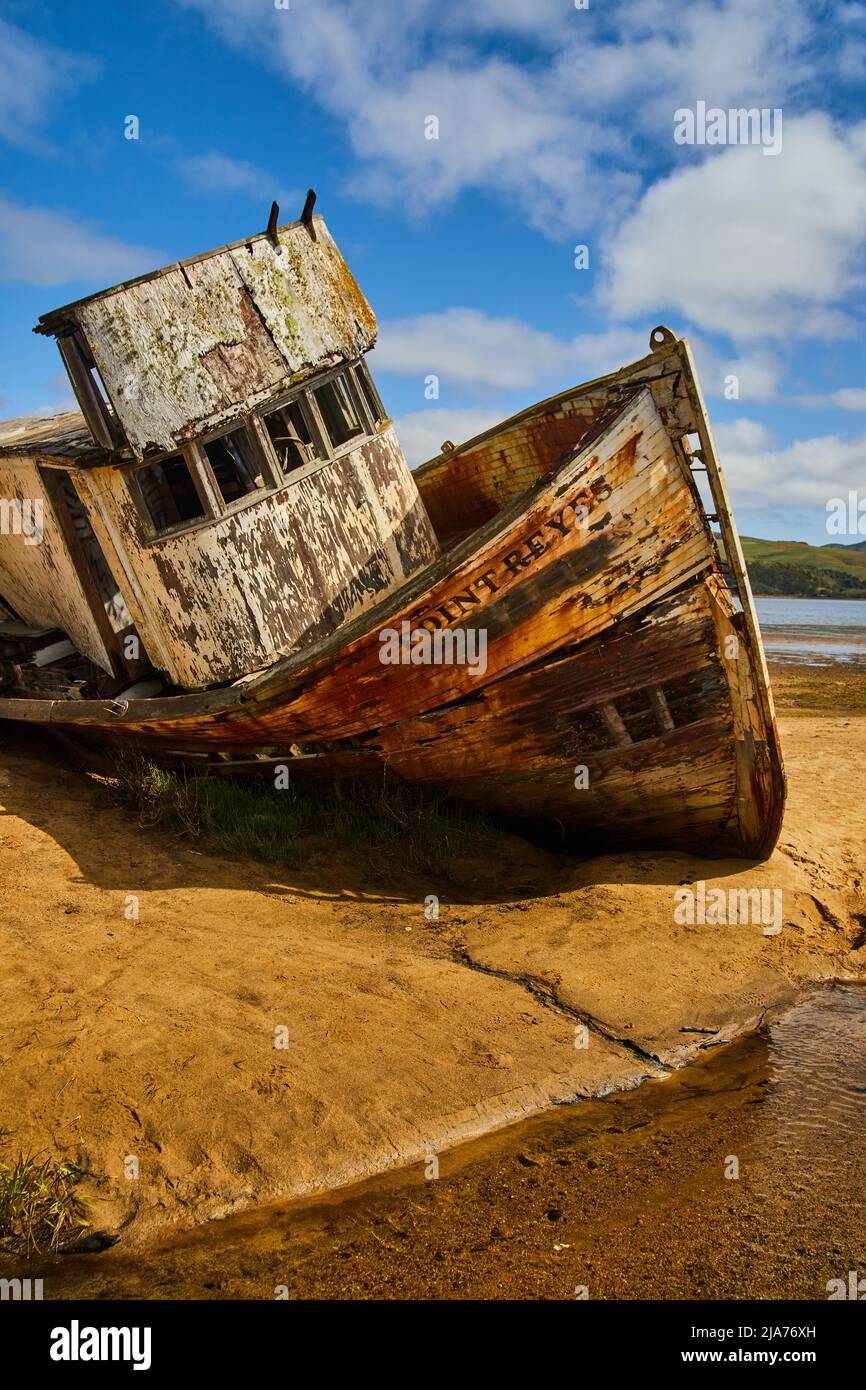 Colorful shipwreck on sandy beach at Point Reyes in California Stock Photo