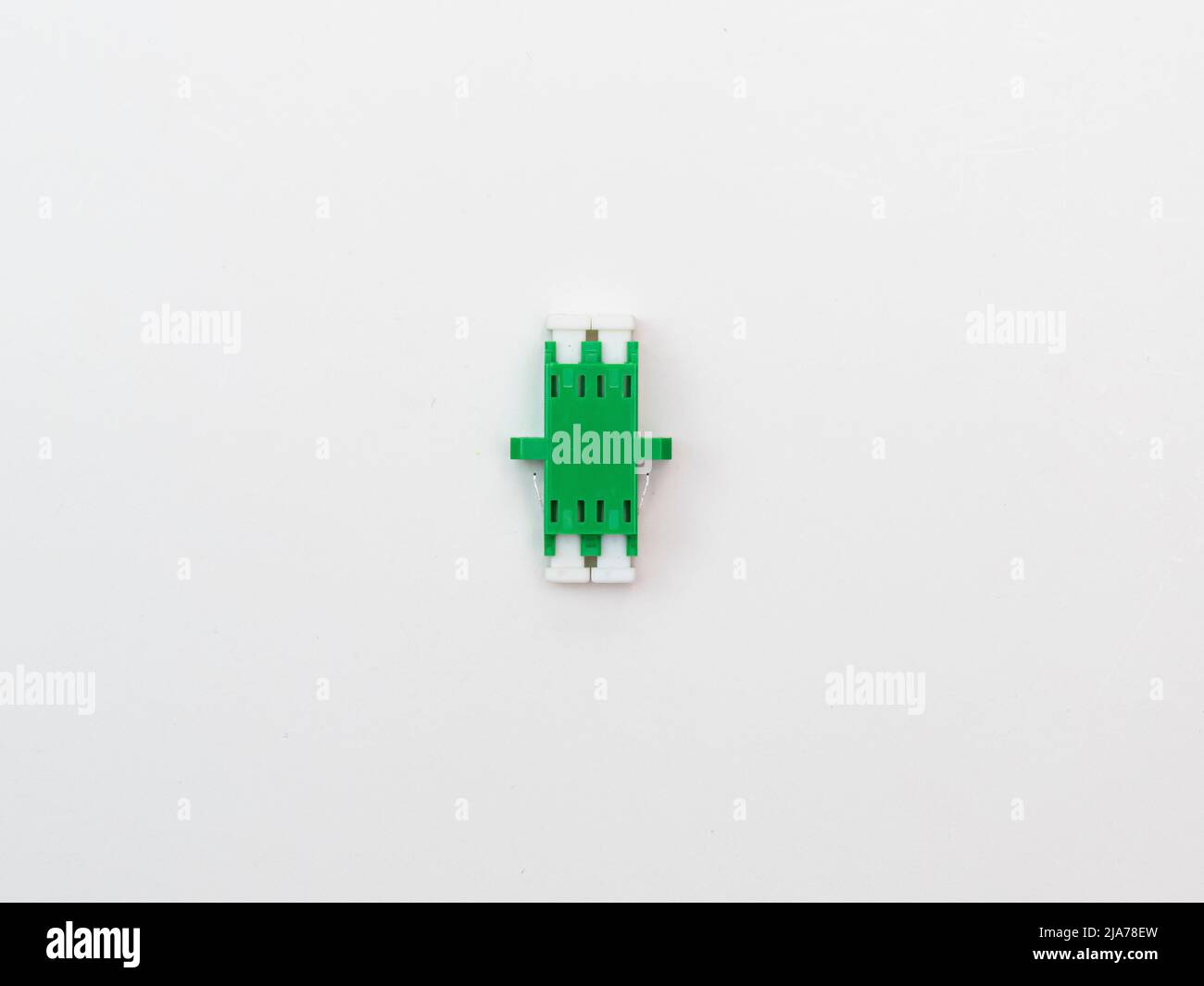 SC-UPC adapter for single mode fiber optic patch cord with flange on isolated white background Stock Photo