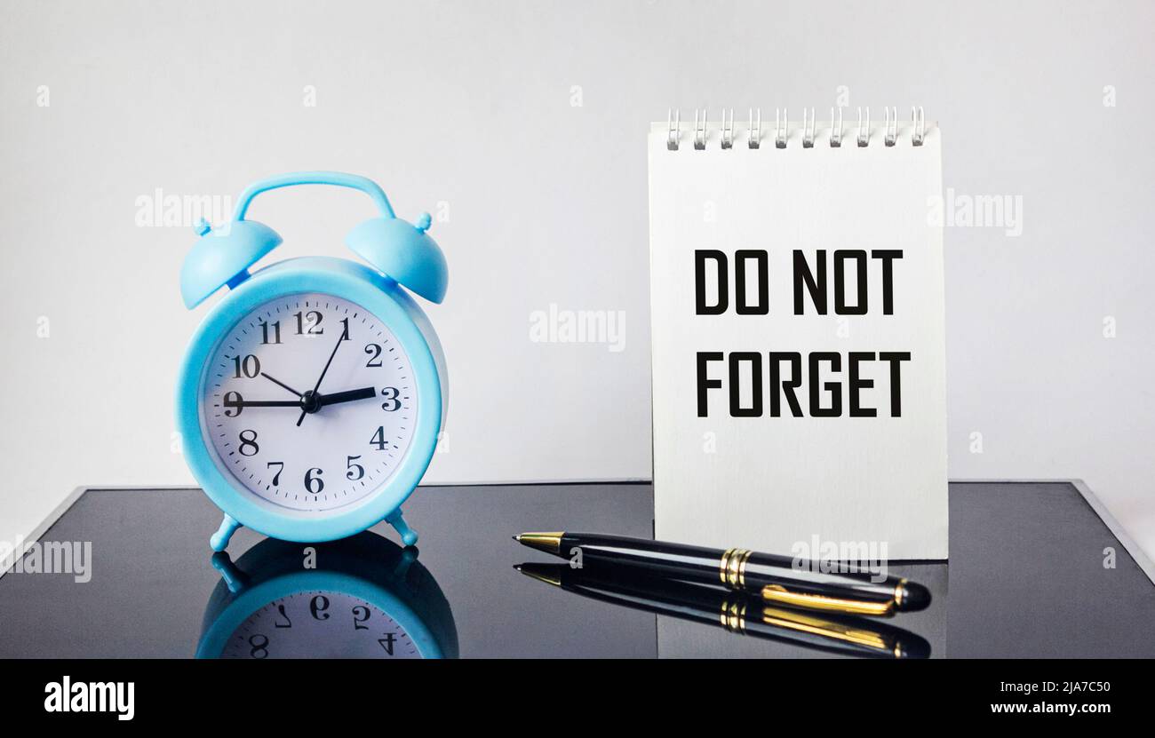 Do not forget memo on a notepad in the office Stock Photo